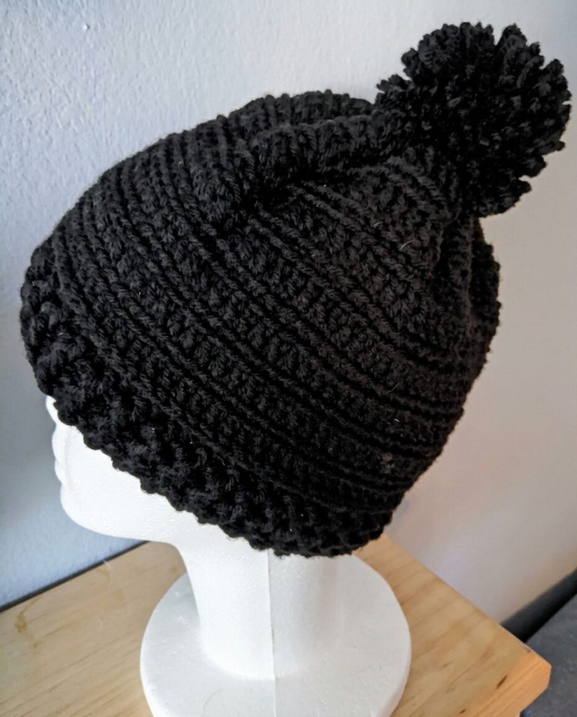 Noira Beanie — Black Crochet Beanie with Pom-Pom